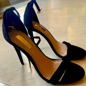 Black high heeled shoes